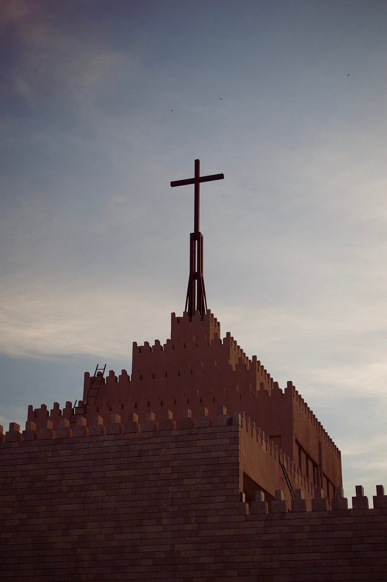 The cross-topped upper façade of Saint Joseph Chaldean Cathedral in Ankawa.